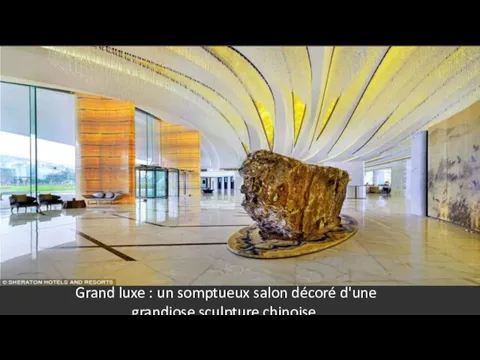 Grand luxe : un somptueux salon décoré d'une grandiose sculpture chinoise.