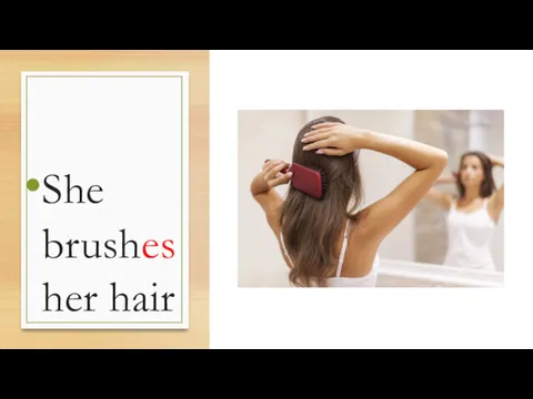 She brushes her hair