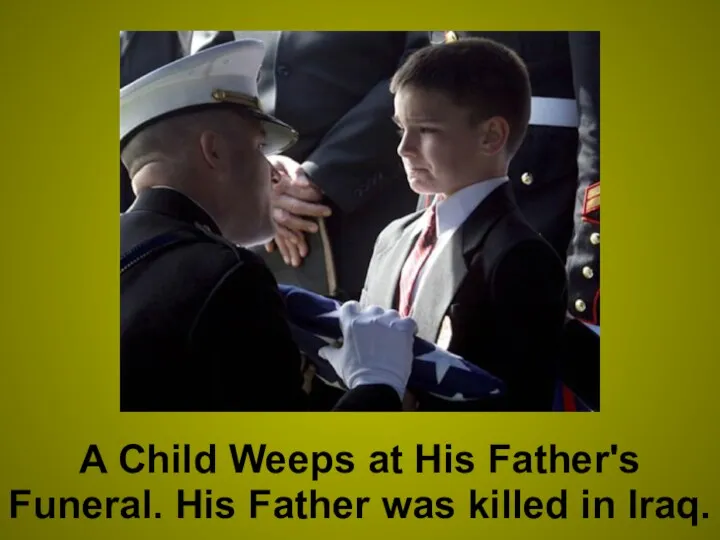 A Child Weeps at His Father's Funeral. His Father was killed in Iraq.