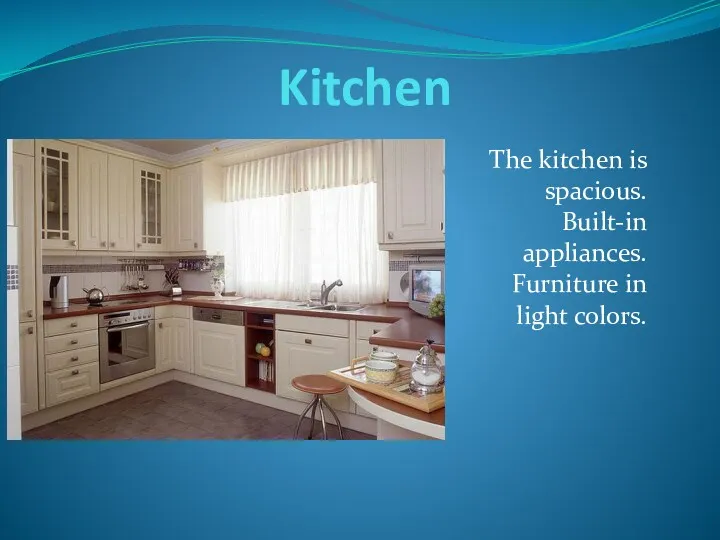 Kitchen The kitchen is spacious. Built-in appliances. Furniture in light colors.