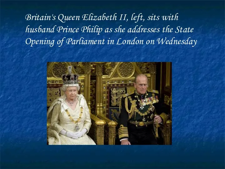 Britain's Queen Elizabeth II, left, sits with husband Prince Philip