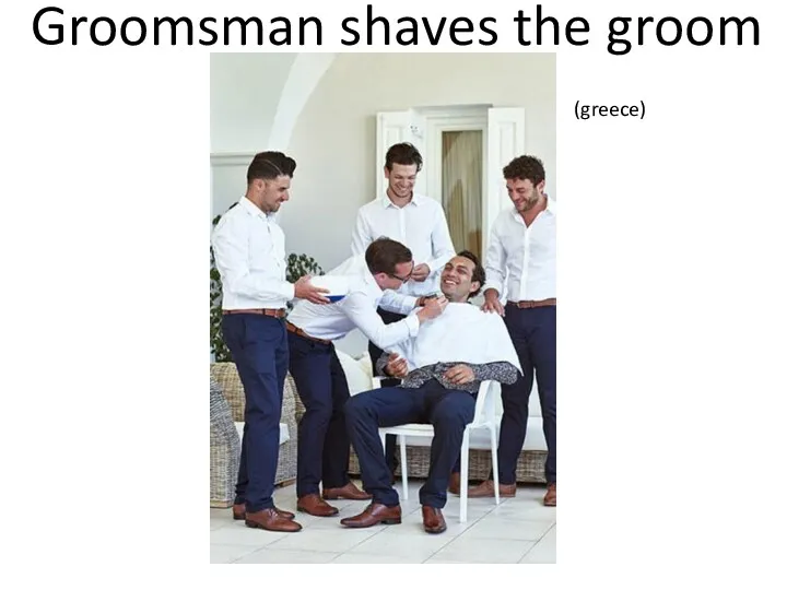Groomsman shaves the groom (greece)