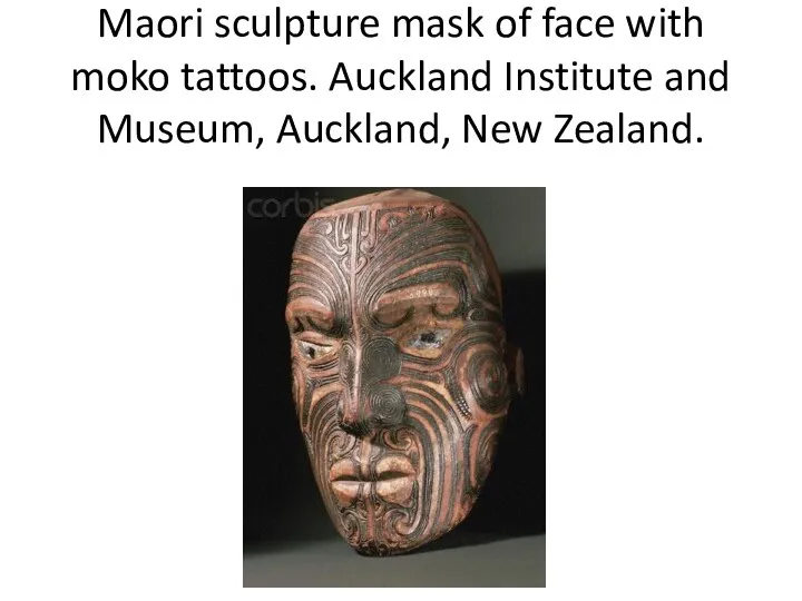 Maori sculpture mask of face with moko tattoos. Auckland Institute and Museum, Auckland, New Zealand.