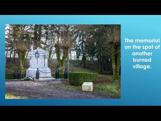 The memorial on the spot of another burned village.