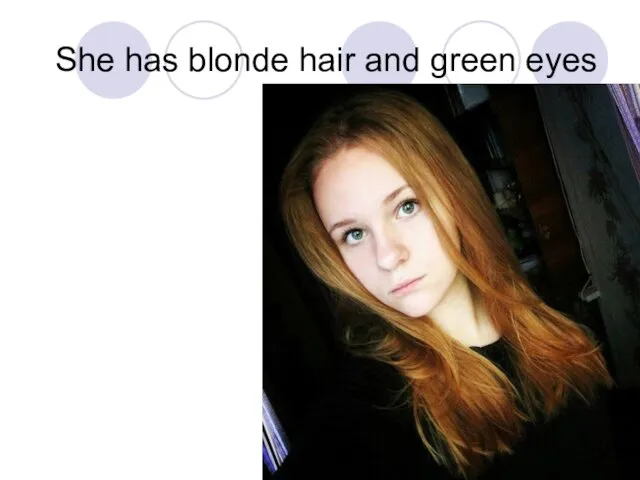 She has blonde hair and green eyes