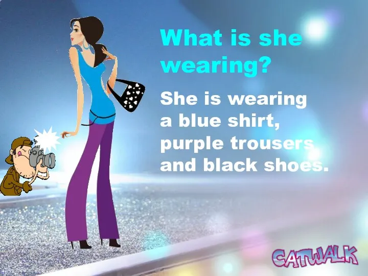 What is she wearing? She is wearing a blue shirt, purple trousers and black shoes.