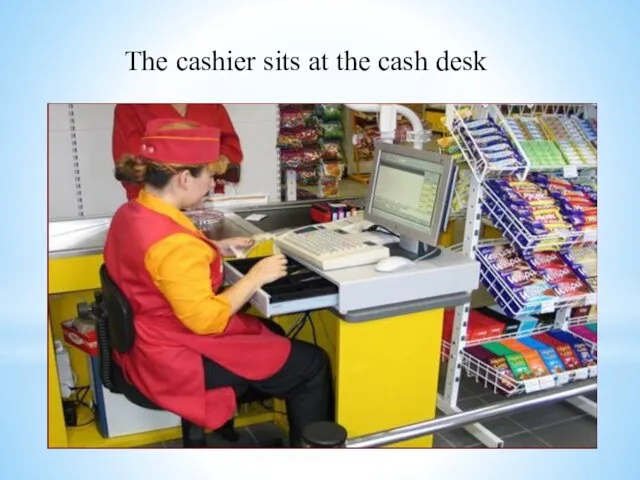 The cashier sits at the cash desk