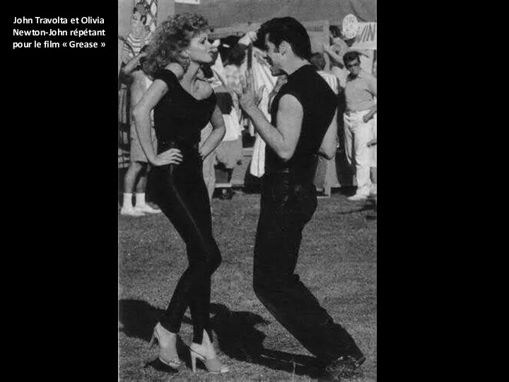 John Travolta et Olivia Newton-John répétant pour le film « Grease »