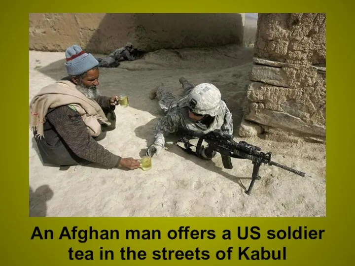 An Afghan man offers a US soldier tea in the streets of Kabul