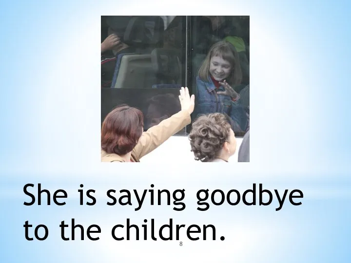 She is saying goodbye to the children.