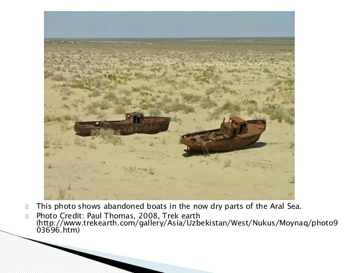 This photo shows abandoned boats in the now dry parts