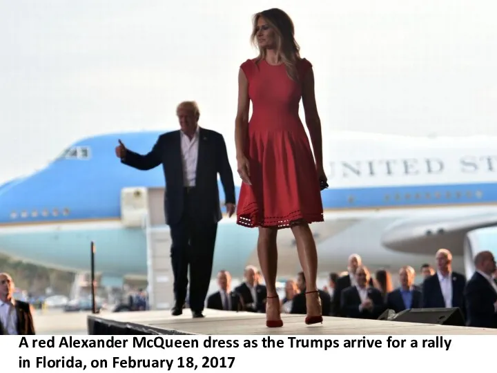 A red Alexander McQueen dress as the Trumps arrive for a rally in
