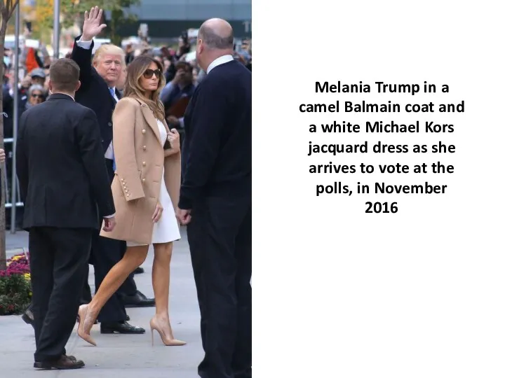 Melania Trump in a camel Balmain coat and a white Michael Kors jacquard