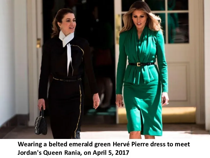 Wearing a belted emerald green Hervé Pierre dress to meet Jordan's Queen Rania,