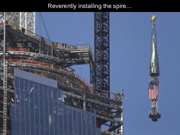 Reverently installing the spire…