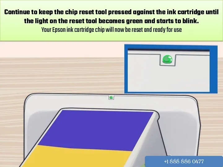 Continue to keep the chip reset tool pressed against the ink cartridge until