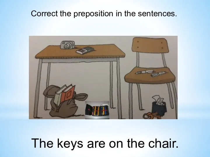 Correct the preposition in the sentences. The keys are on the chair.