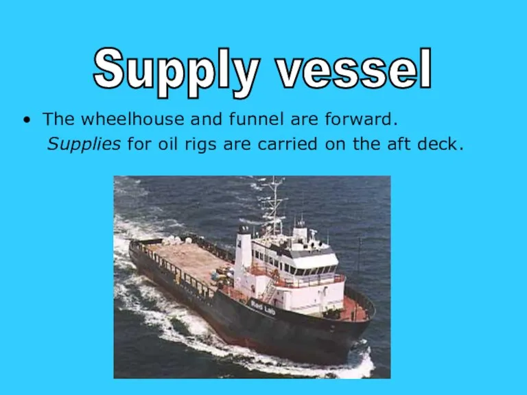 The wheelhouse and funnel are forward. Supplies for oil rigs