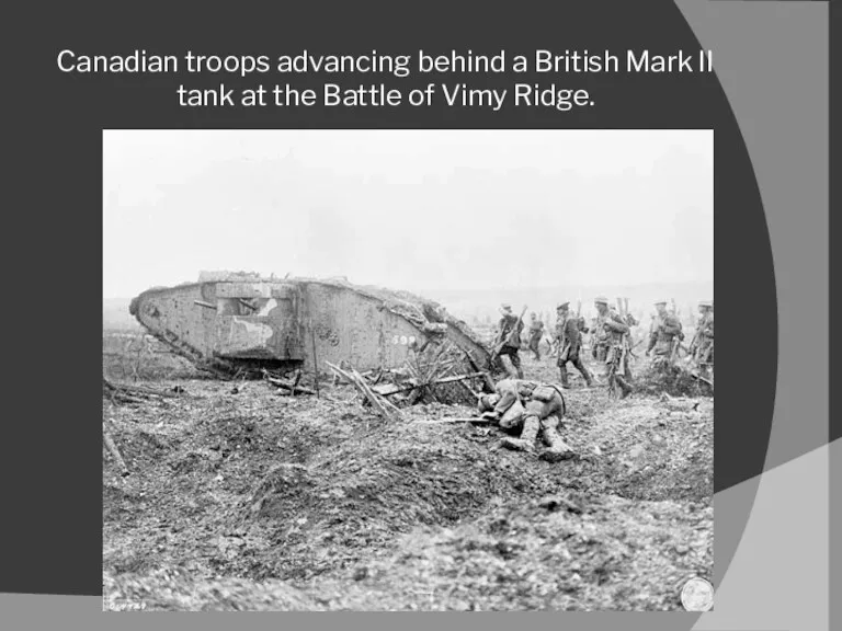 Canadian troops advancing behind a British Mark II tank at the Battle of Vimy Ridge.