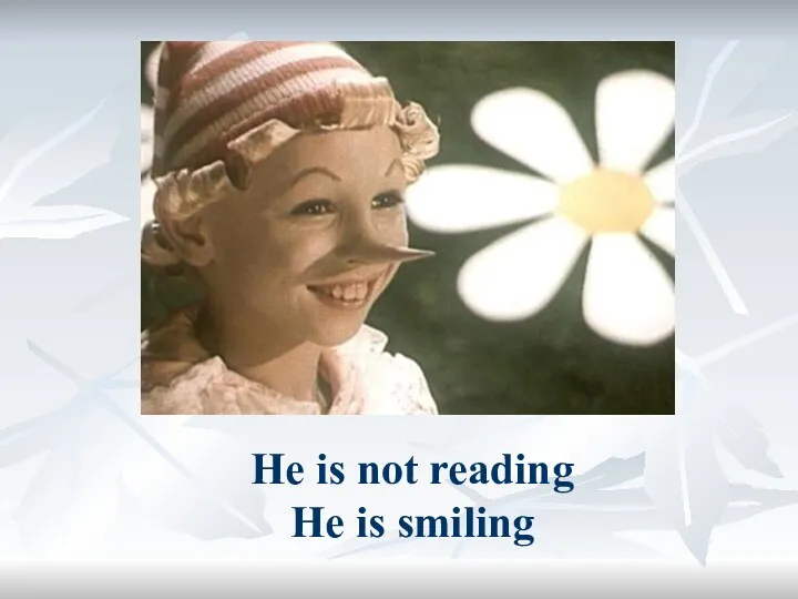 He is not reading He is smiling