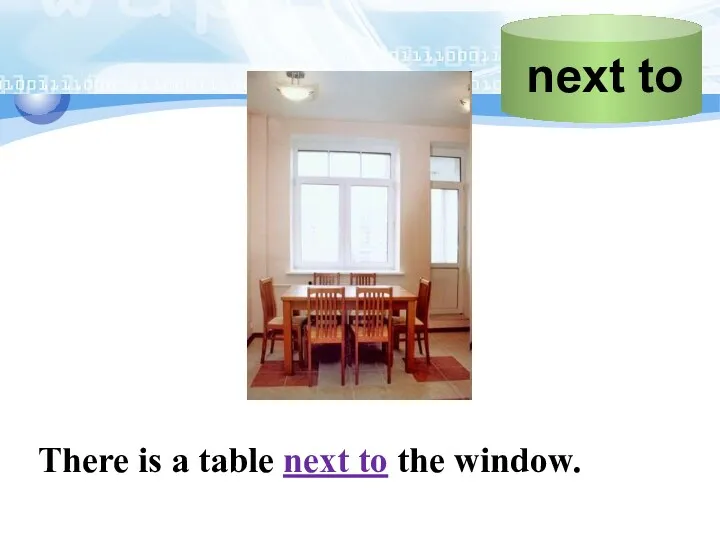 There is a table next to the window.