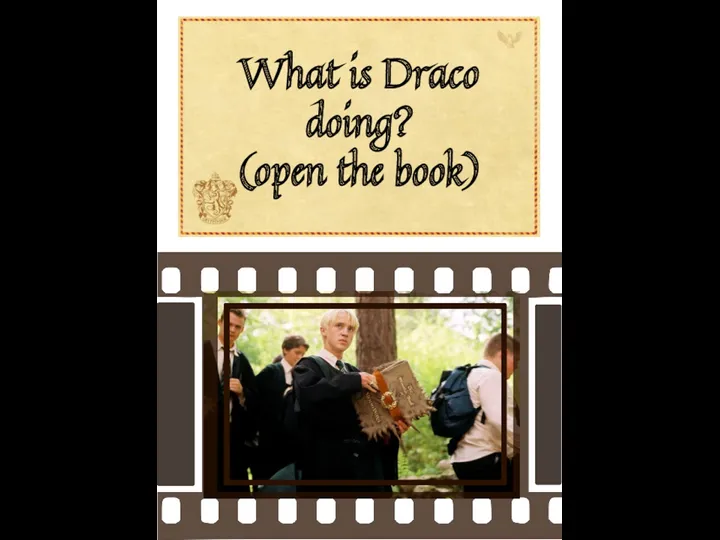 What is Draco doing? (open the book)