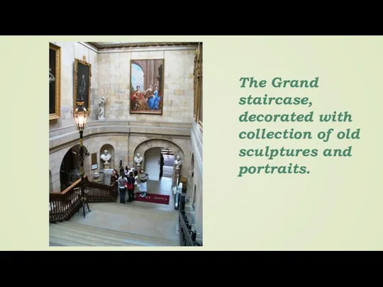 The Grand staircase, decorated with collection of old sculptures and portraits.