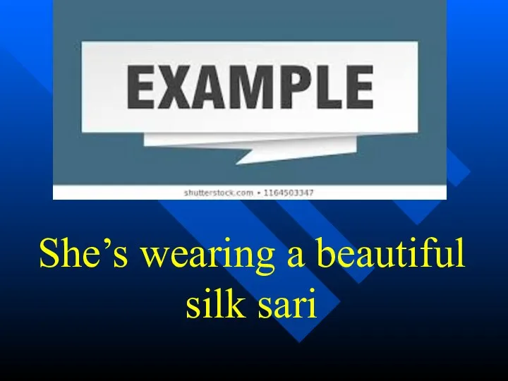 She’s wearing a beautiful silk sari