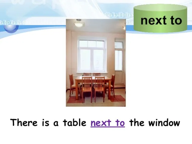 There is a table next to the window