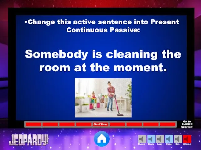 Change this active sentence into Present Continuous Passive: Somebody is cleaning the room at the moment.