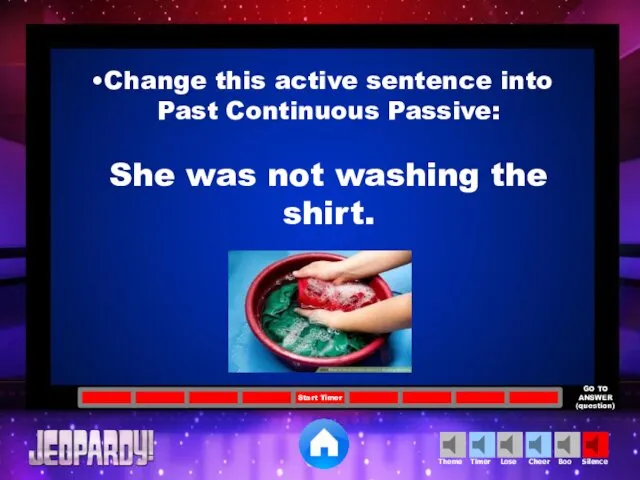 Change this active sentence into Past Continuous Passive: She was not washing the shirt.