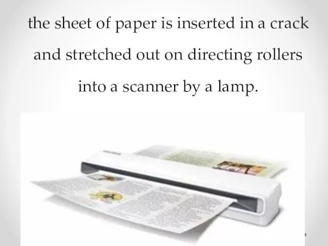 the sheet of paper is inserted in a crack and stretched out on directing rollers