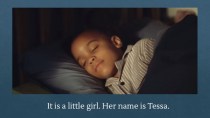 It is a little girl. Her name is Tessa